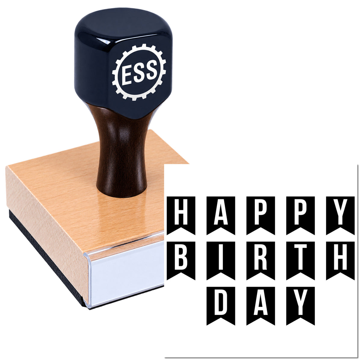 Navy rubber stamp and seal on a pink wooden block, with black "HAPPY BIRTH DAY" banner letters.