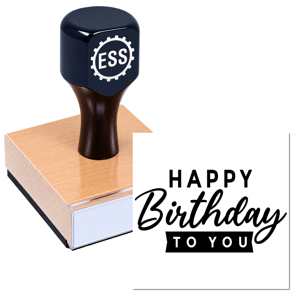 Black ESS rubber stamp and seal on wooden base with pink face, featuring a "Happy Birthday to You" design.