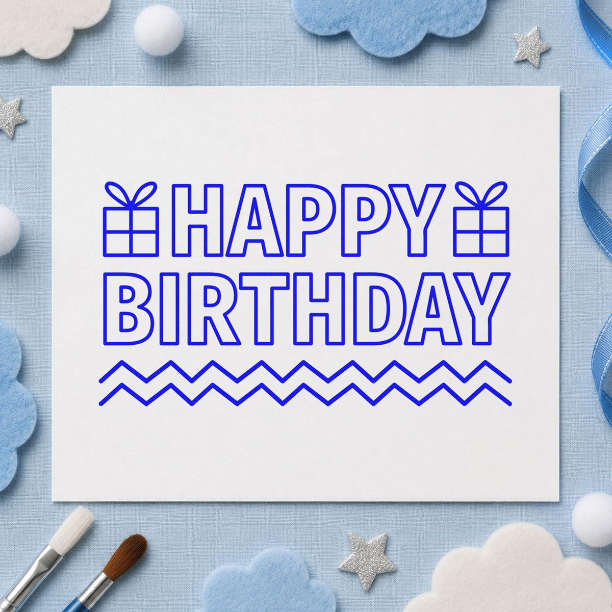Outlined Birthday Gifts Zigzags craft stamp in blue ink on cardstock, an easy option for table cover printing.