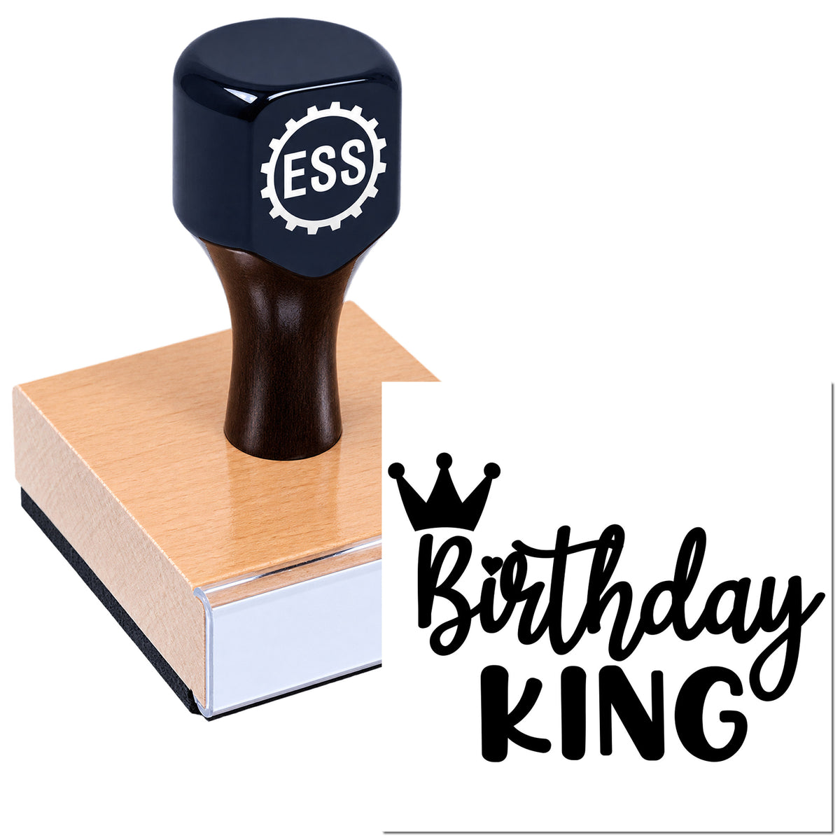 Black ESS rubber stamp and seal on rose gold base with Birthday King crown graphic on a white background