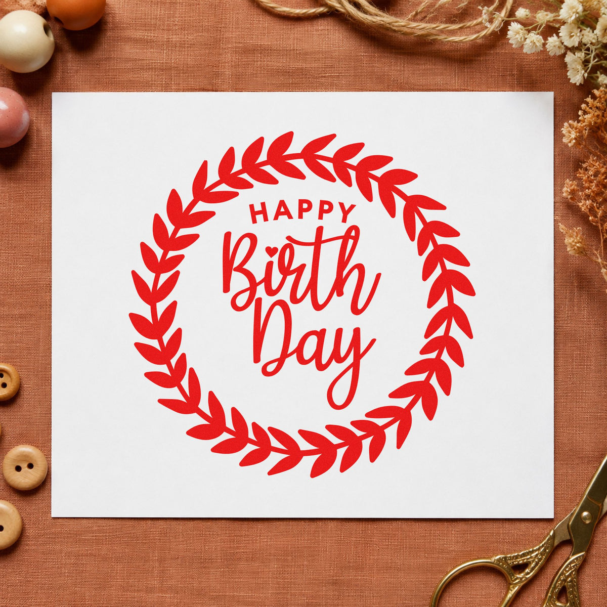 Happy Birthday Leafy Wreath craft stamp imprint in red ink on a handmade project, one idea being nature find cards.