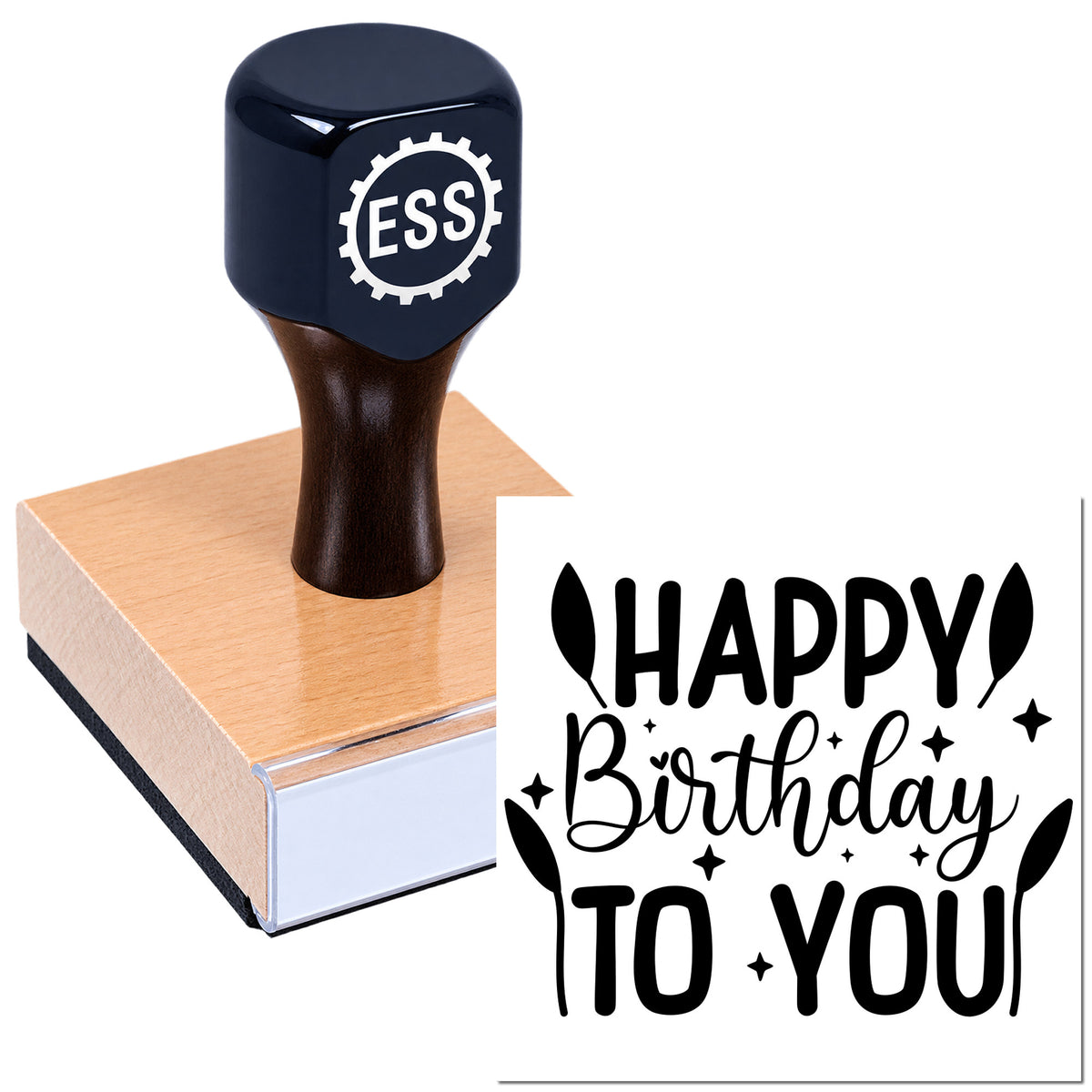 Black ESS stamp and seal with wooden handle, pressing a block beside a bold black "Happy Birthday To You" design on white background