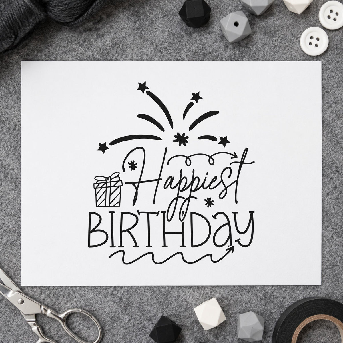Happiest Birthday Gift Fireworks craft stamp imprint in black ink on a handmade project, one idea being cooler gift tags.