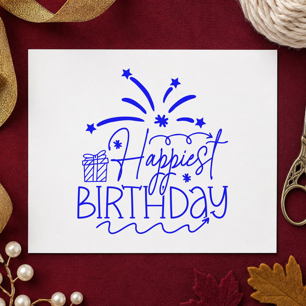 Happiest Birthday Gift Fireworks craft stamp in blue ink on cardstock, an easy option for grill apron printing.