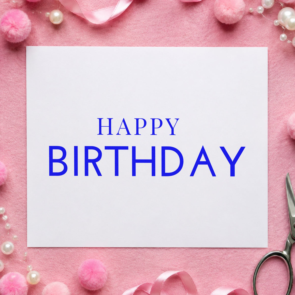 Simple Happy Birthday Capitals craft stamp imprinted in blue ink on paper, a design suited to framed dining wall.