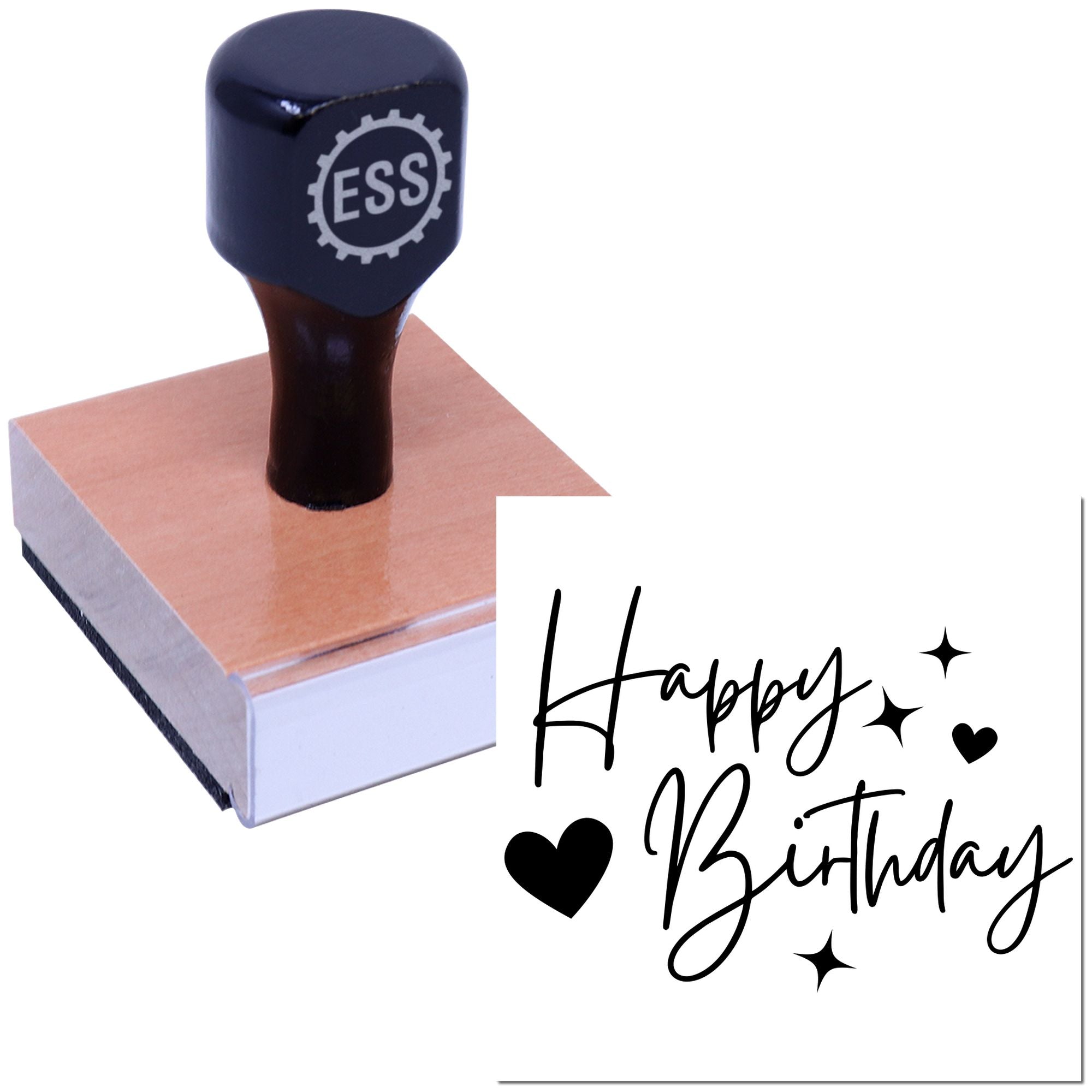 Black ESS stamp and seal on a pink wood block with Happy Birthday script, hearts, and stars in black.