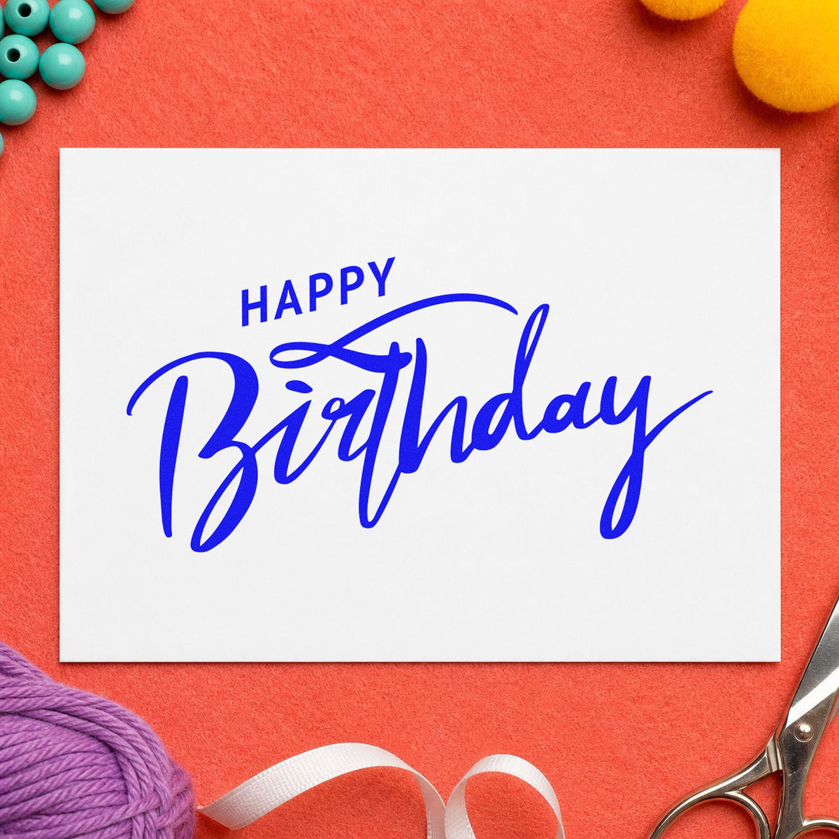 Happy Birthday Brush Flourish craft stamp imprinted in blue ink on paper, a design suited to framed work studio.