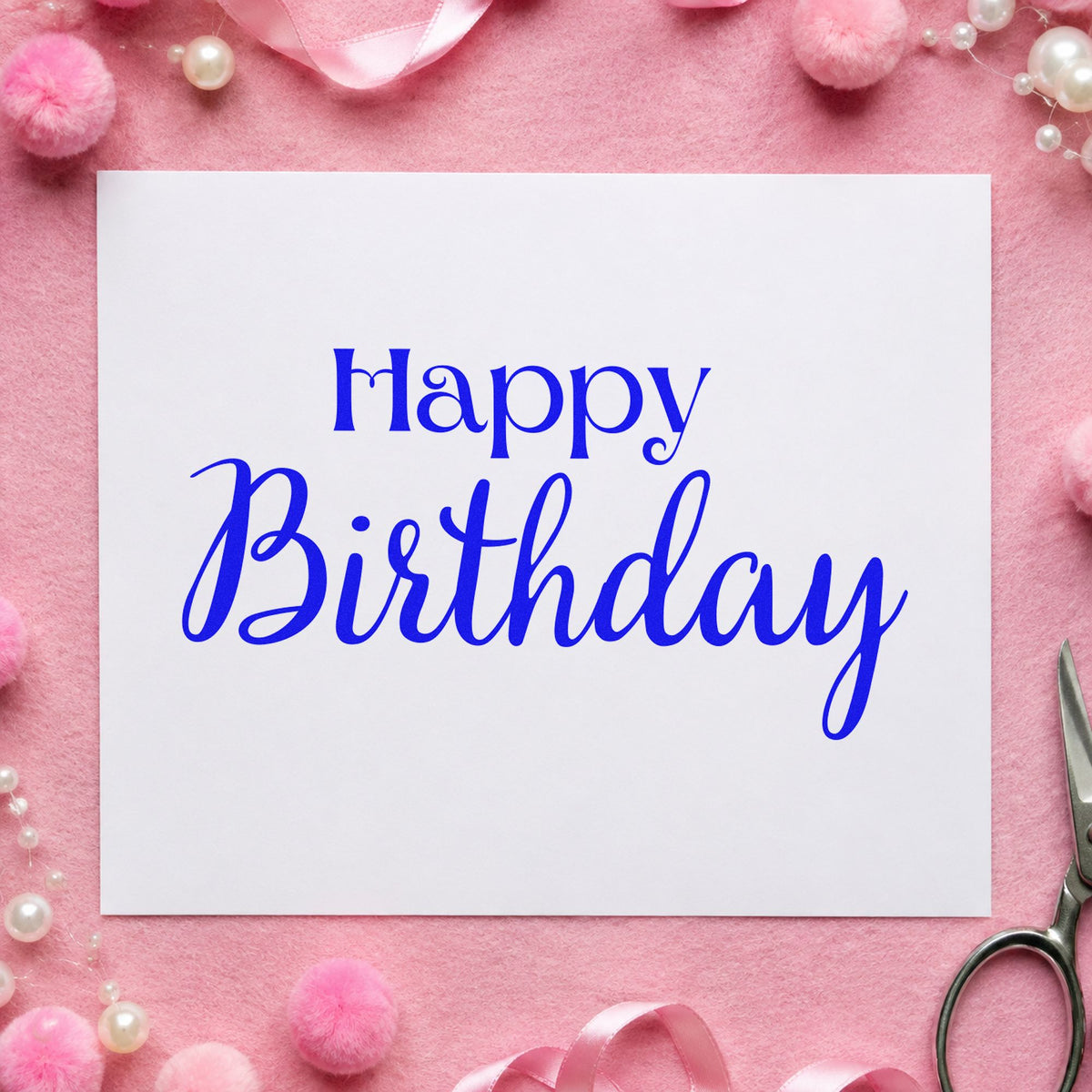 Happy Birthday Serif Script craft stamp imprinted in blue ink on paper, a design suited to framed corridor nook.