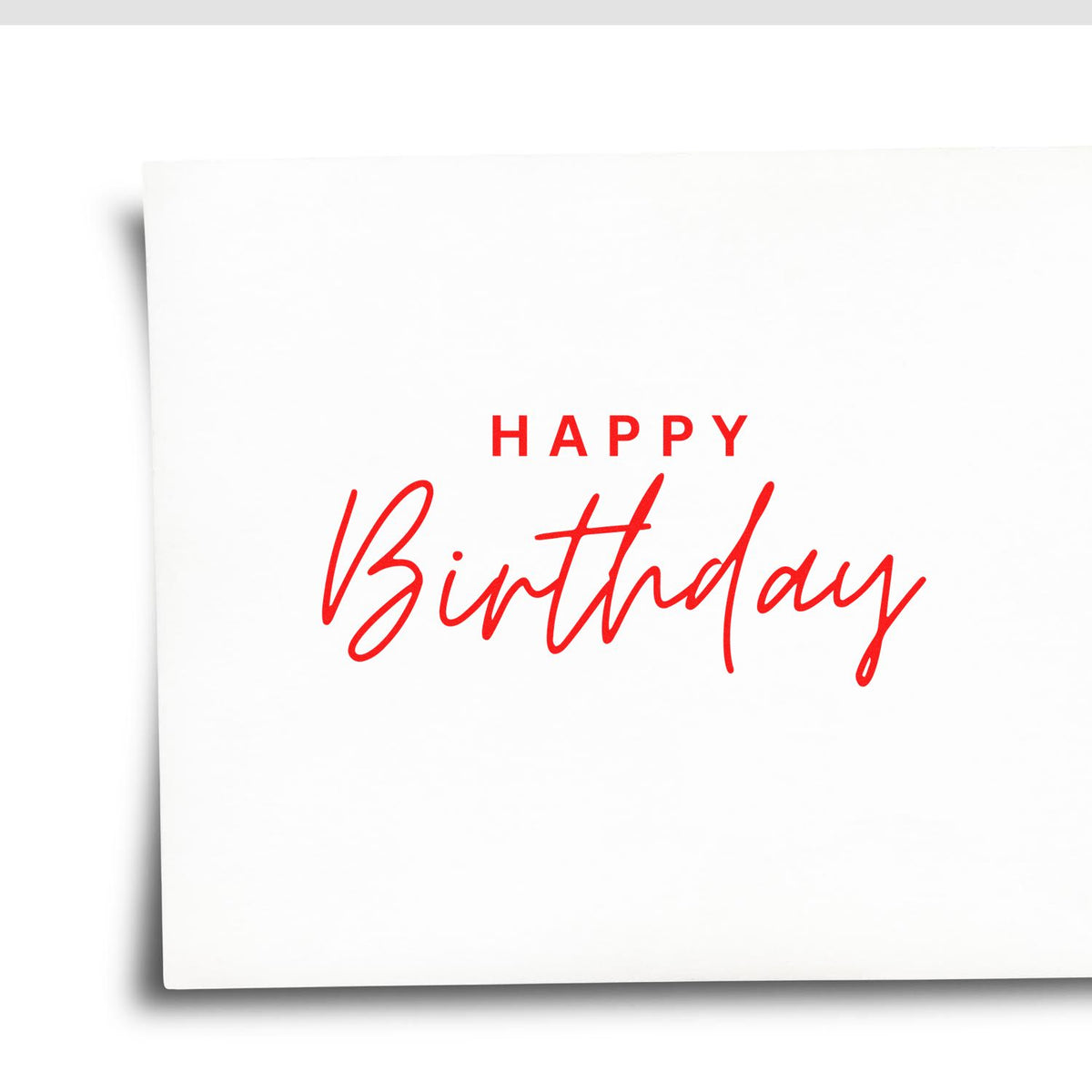 Custom stamp and seal sample with white card and red Happy Birthday lettering in script and block text.