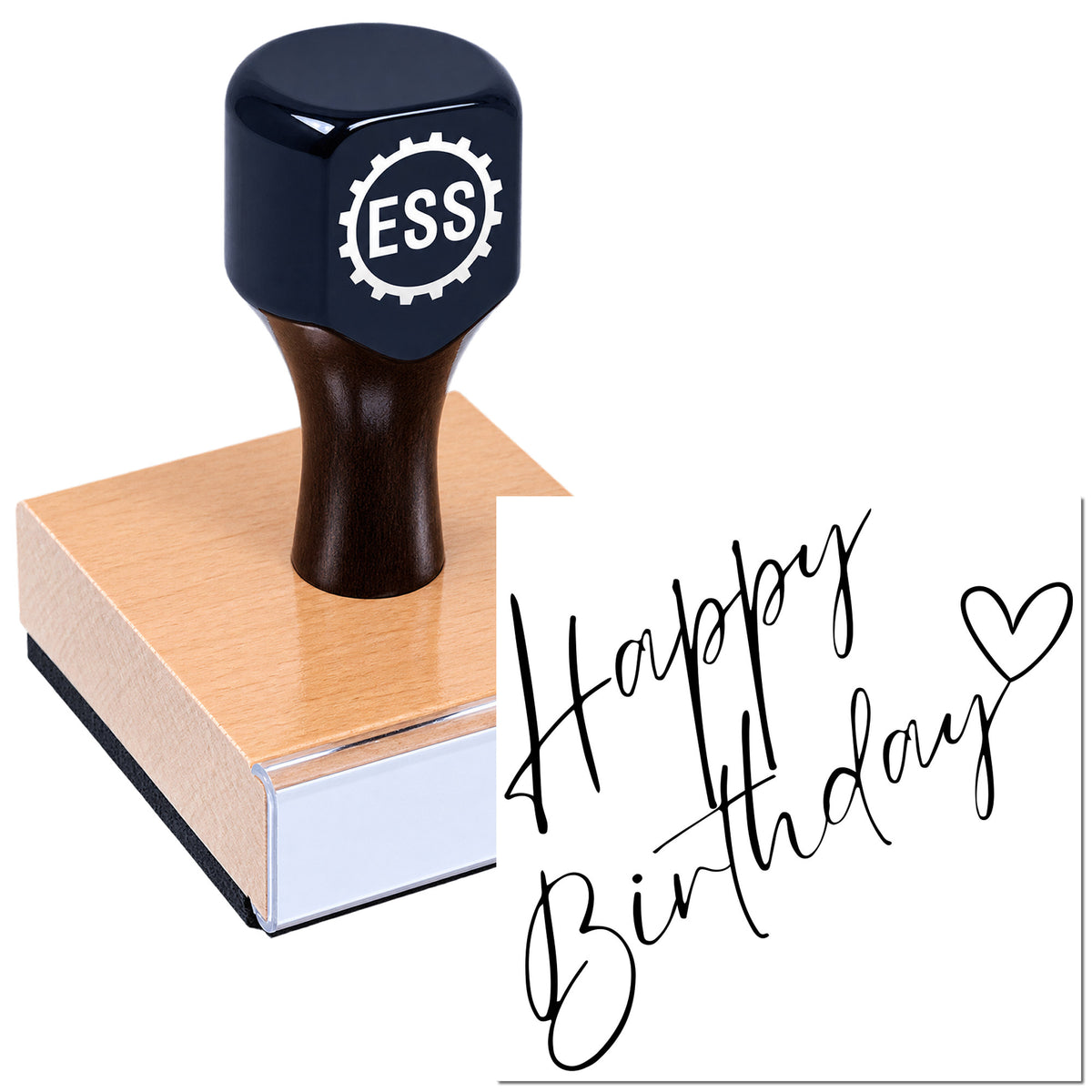 Black ESS rubber stamp and seal on a wooden block, printing "Happy Birthday" with a heart in black ink.