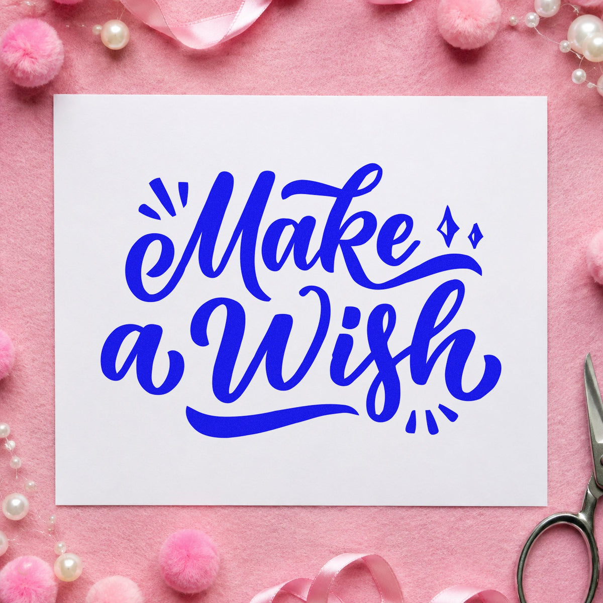 Make A Wish Script craft stamp imprinted in blue ink on paper, a design suited to framed mantel shelf.