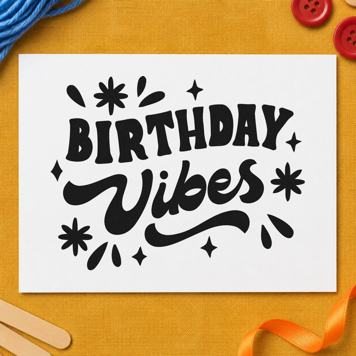 Birthday Vibes Starburst Script craft stamp imprint in black ink on a handmade project, one idea being towel roll gift tags.