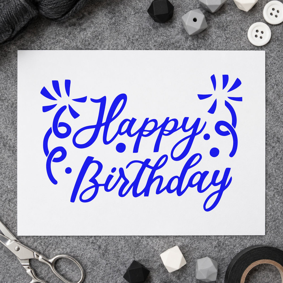 Birthday Script Corner Flourishes craft stamp in blue ink on cardstock, an easy option for backdrop cloth printing.