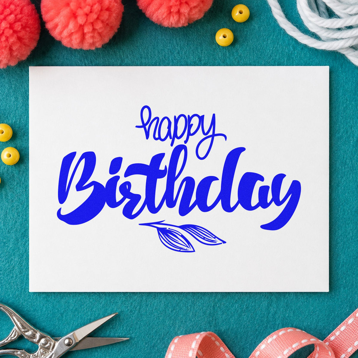 Birthday Script Leaf Sprig craft stamp in blue ink on cardstock, an easy option for plant sleeve printing.