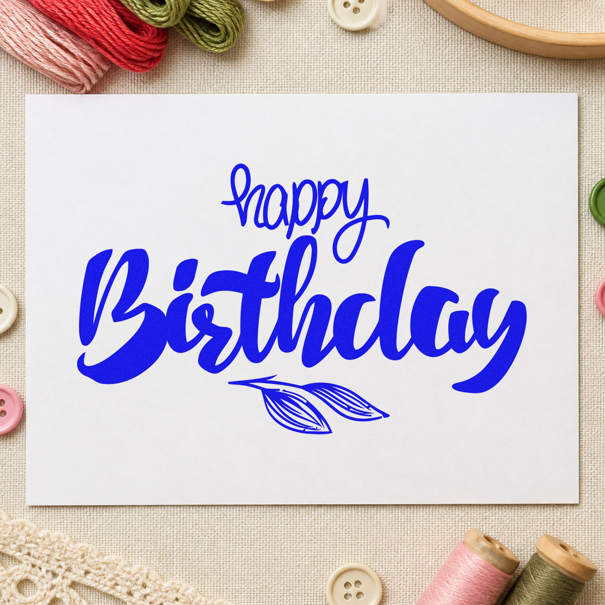 Birthday Script Leaf Sprig craft stamp imprinted in blue ink on paper, a design suited to framed potting bench.