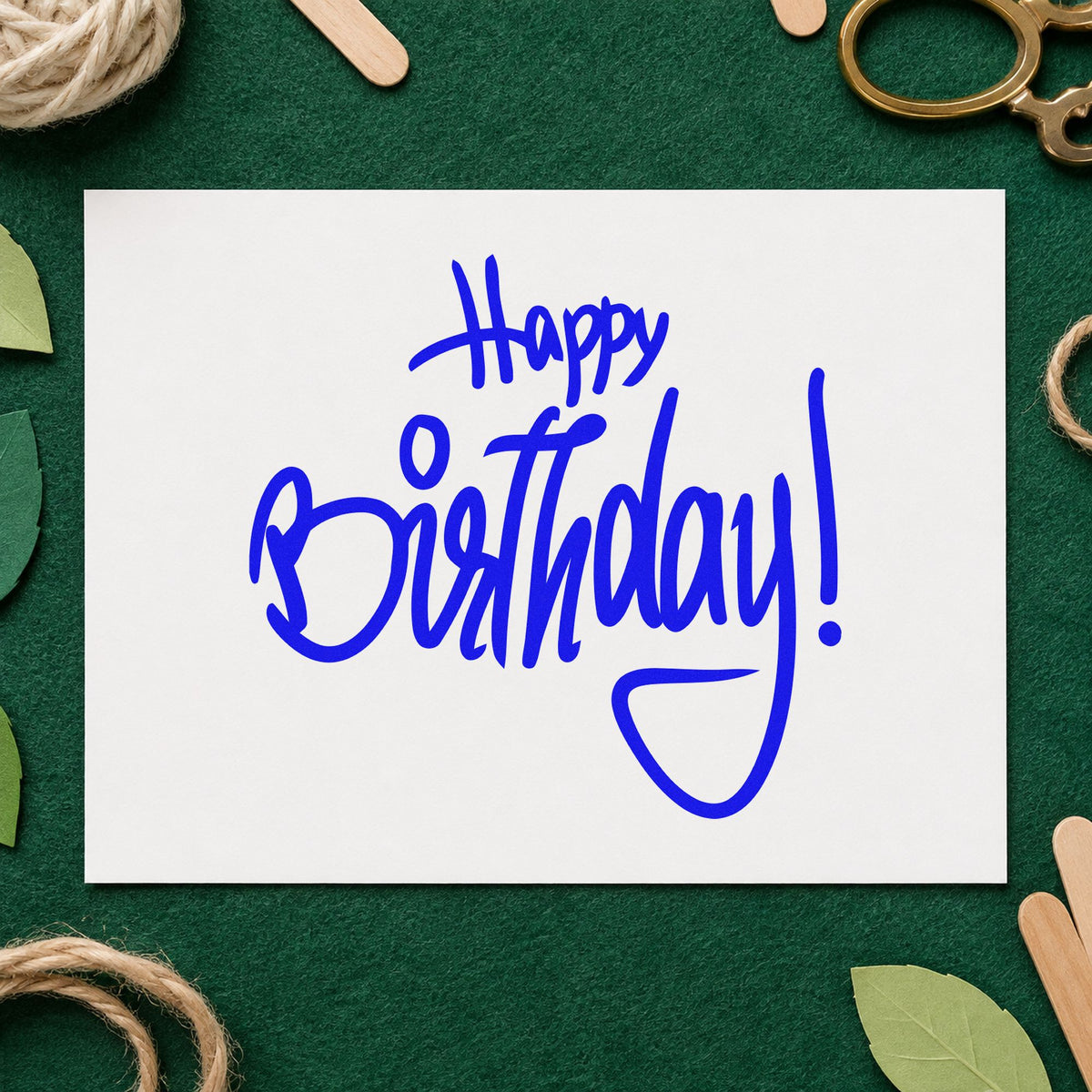 Happy Birthday Tall Script craft stamp imprinted in blue ink on paper, a design suited to framed tasting room.