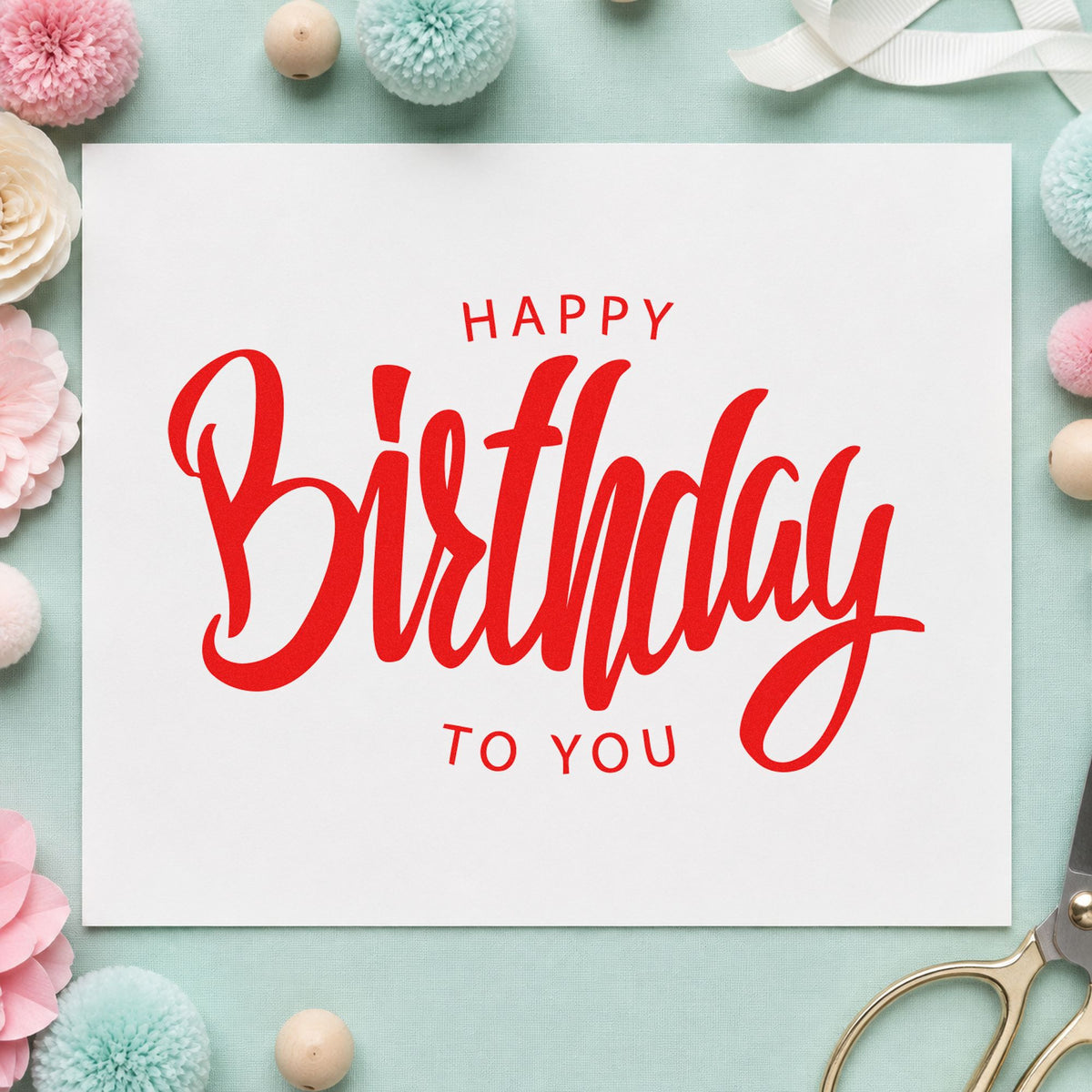 Happy Birthday To You craft stamp imprint in red ink on a handmade project, one idea being name read cards.