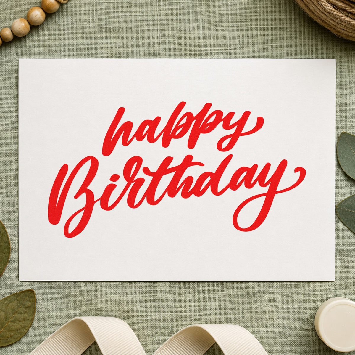Happy Birthday Slanted Brush craft stamp imprint in red ink on a handmade project, one idea being loyalty punch cards.