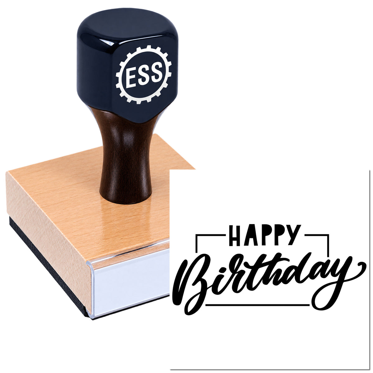 Black ESS rubber stamp on wooden block beside a white Happy Birthday seal, with pink base.