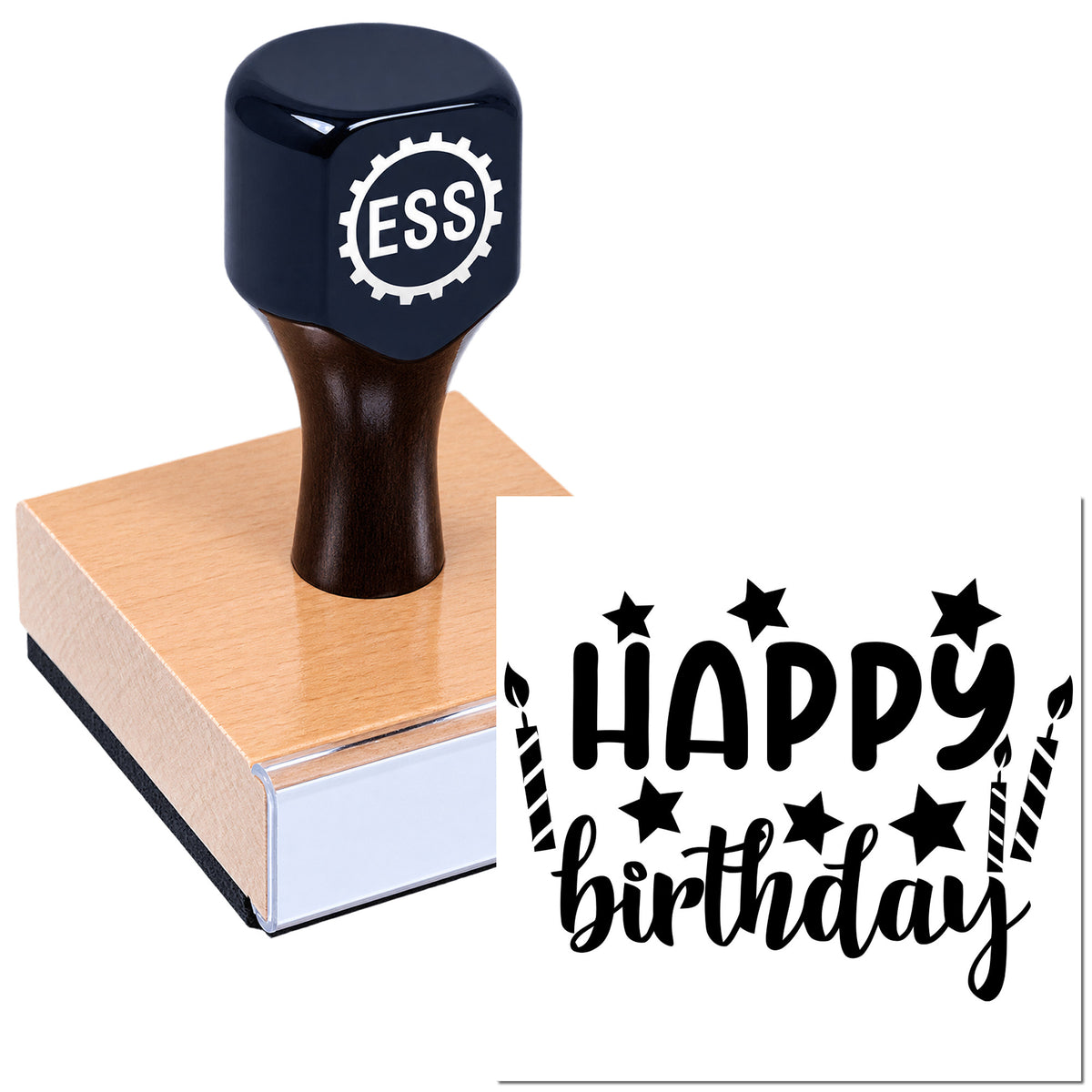 Dark navy ESS rubber stamp on a wooden block, with black "Happy Birthday" seal impression, stars, and candles.