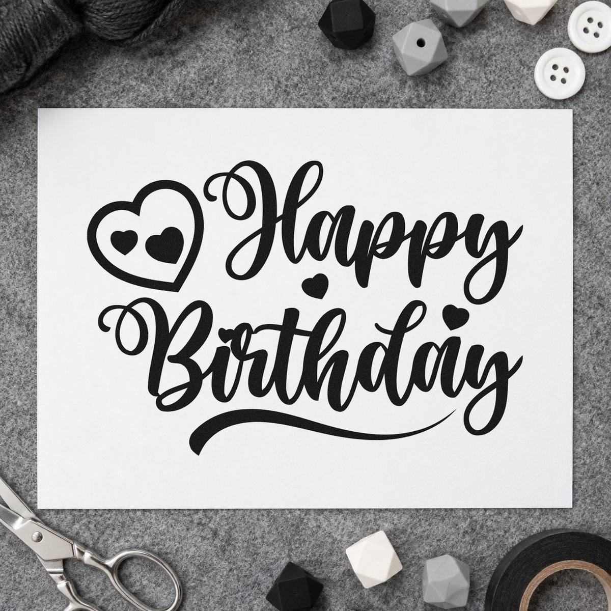 Happy Birthday Heart Swirl craft stamp imprint in black ink on a handmade project, one idea being comfort gift tags.