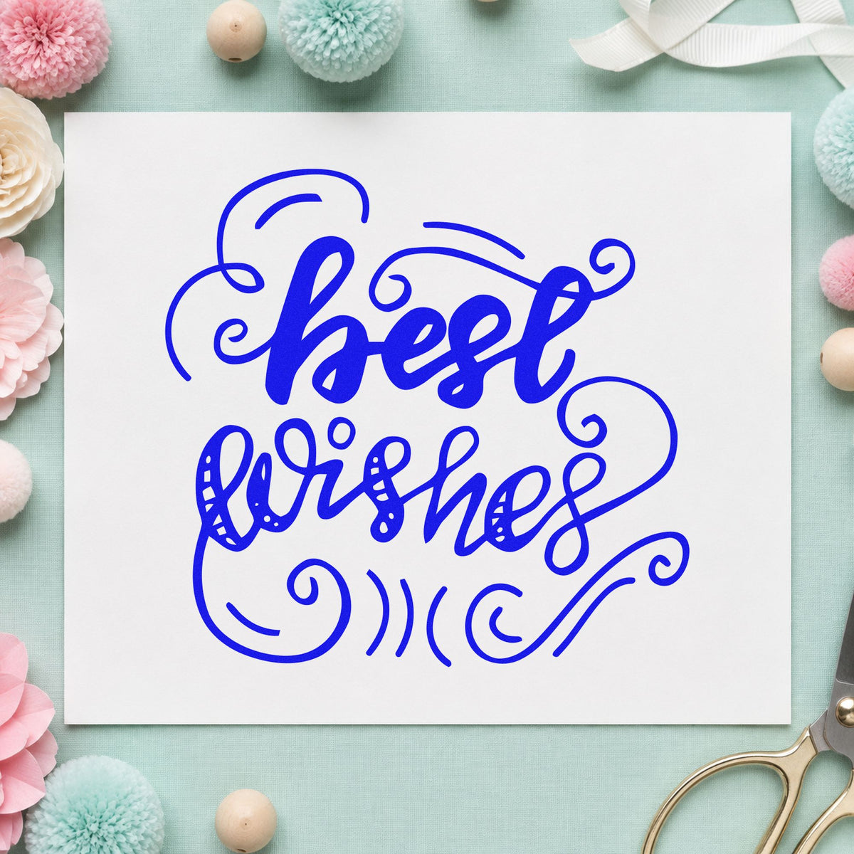 Best Wishes Curled Flourishes craft stamp imprinted in blue ink on paper, a design suited to framed break room.