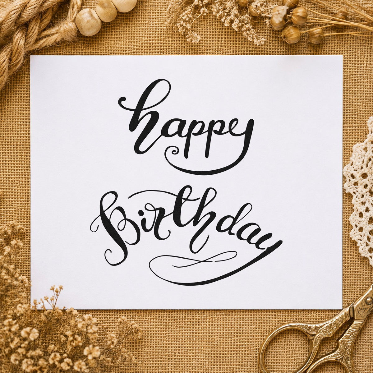 Happy Birthday Curved Script craft stamp imprint in black ink on a handmade project, one idea being pen set gift tags.
