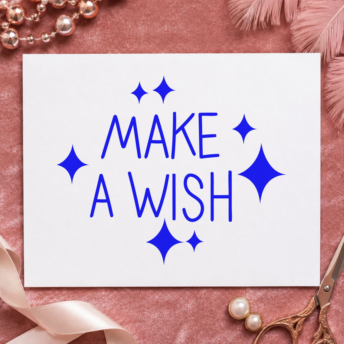 Make A Wish Sparkles craft stamp imprinted in blue ink on paper, a design suited to framed bedroom shelf.
