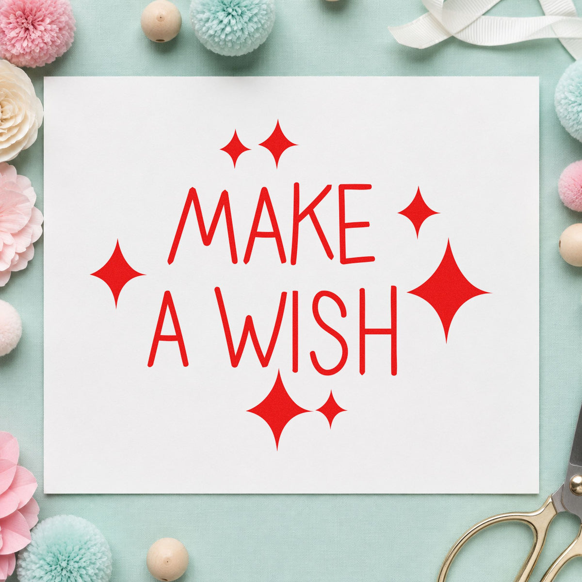 Make A Wish Sparkles craft stamp imprint in red ink on a handmade project, one idea being wish slip cards.
