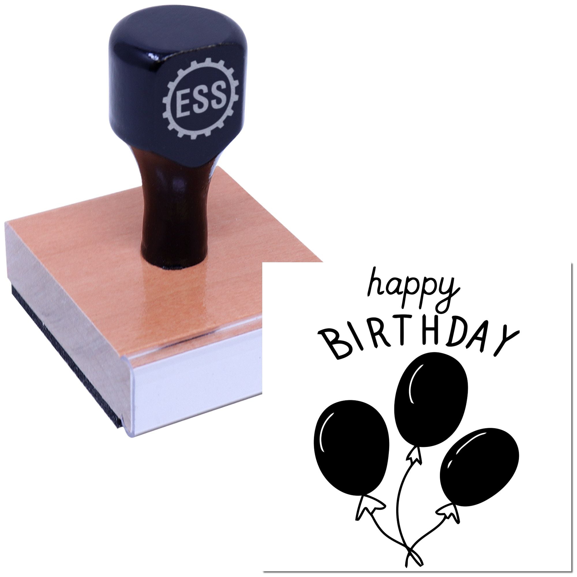 Dark blue ESS rubber stamp on a wood base beside a black happy BIRTHDAY balloon seal design on white.
