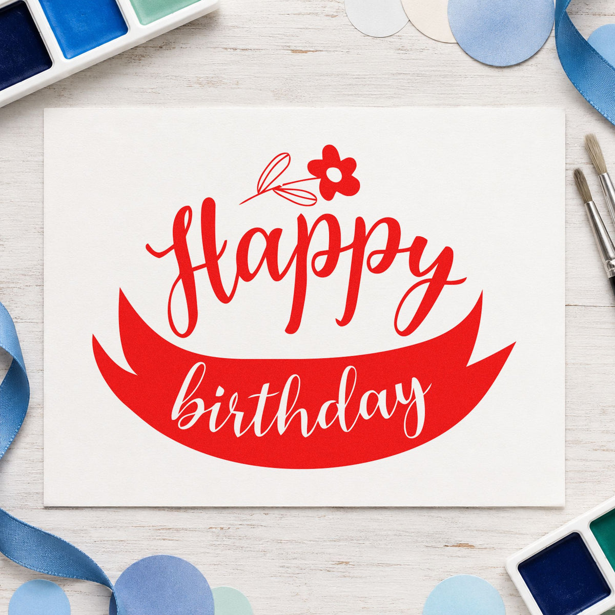 Happy Birthday Flower Ribbon rubber stamp shown in red ink, stamped for projects such as bed variety labels.