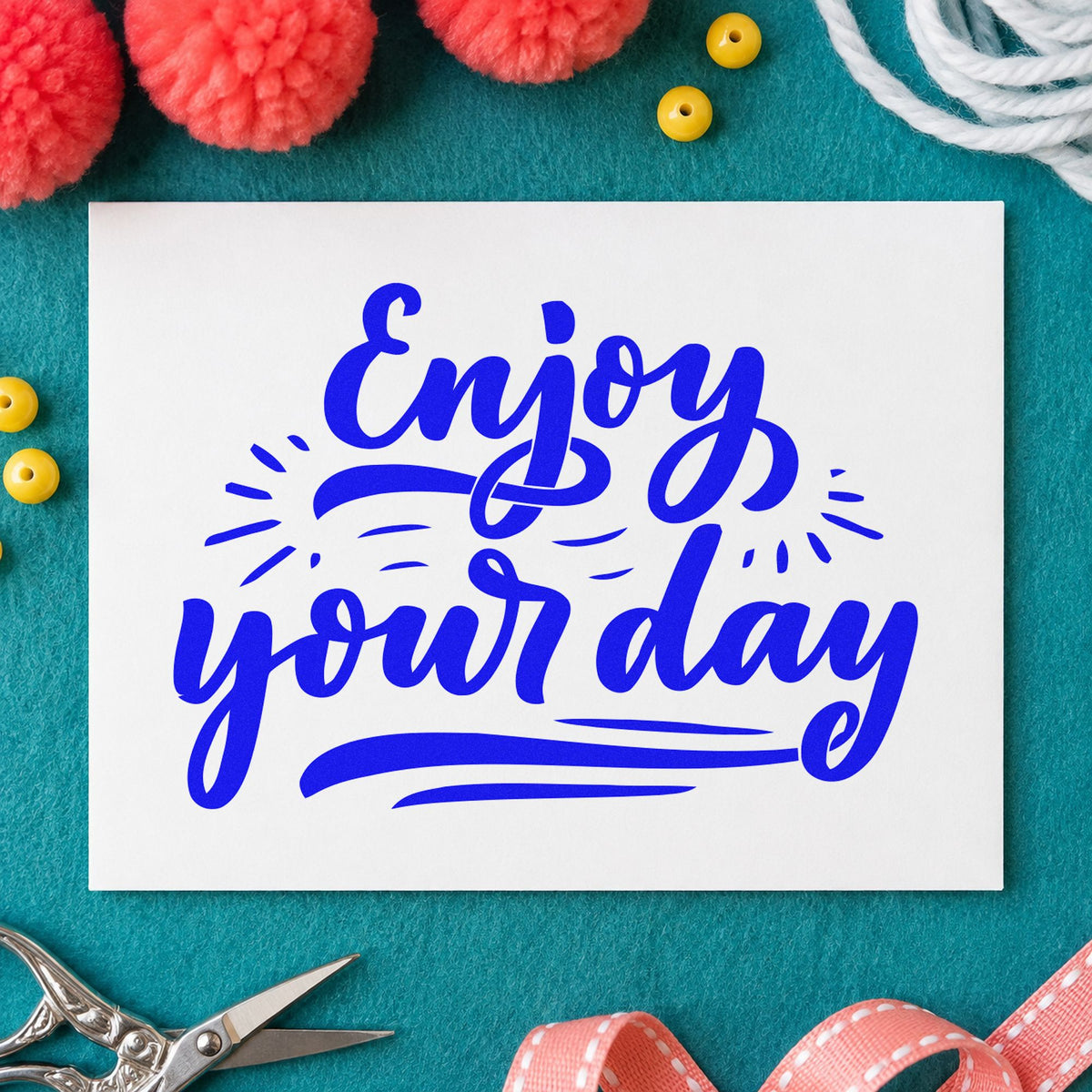 Enjoy Your Day Script craft stamp in blue ink on cardstock, an easy option for tote panel printing.