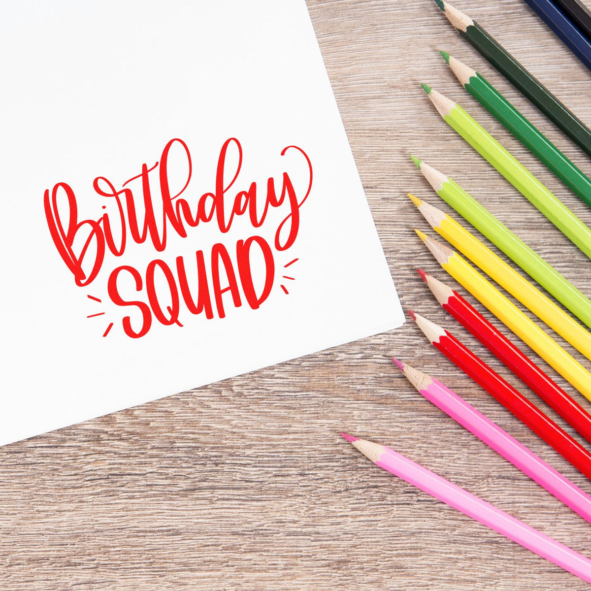 Red Birthday Squad stamp-and-seal design on white card, with colorful pencils