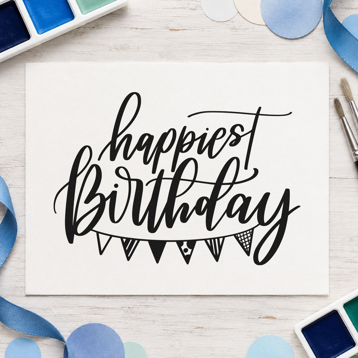 Happiest Birthday Pennant Bunting craft stamp imprint in black ink on a handmade project, one idea being purchase gift tags.