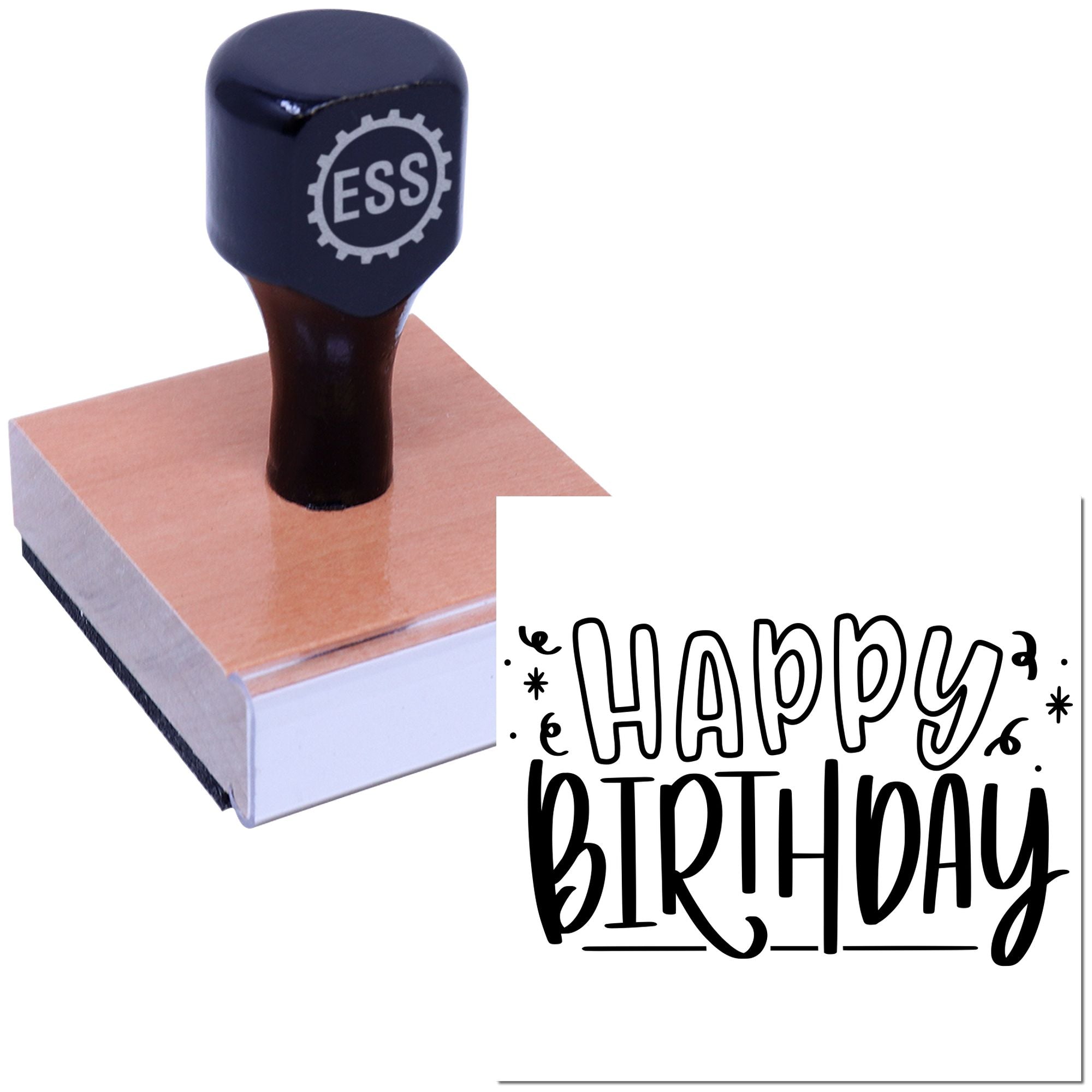 Black ESS stamp and seal on a wood block, imprinting Happy Birthday in bold black lettering.