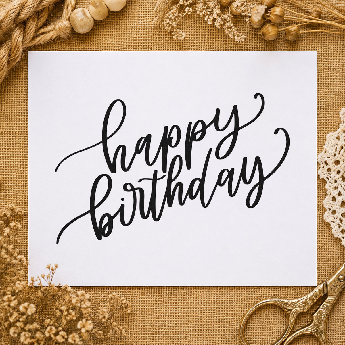 Happy Birthday Diagonal Script craft stamp imprint in black ink on a handmade project, one idea being award gift tags.