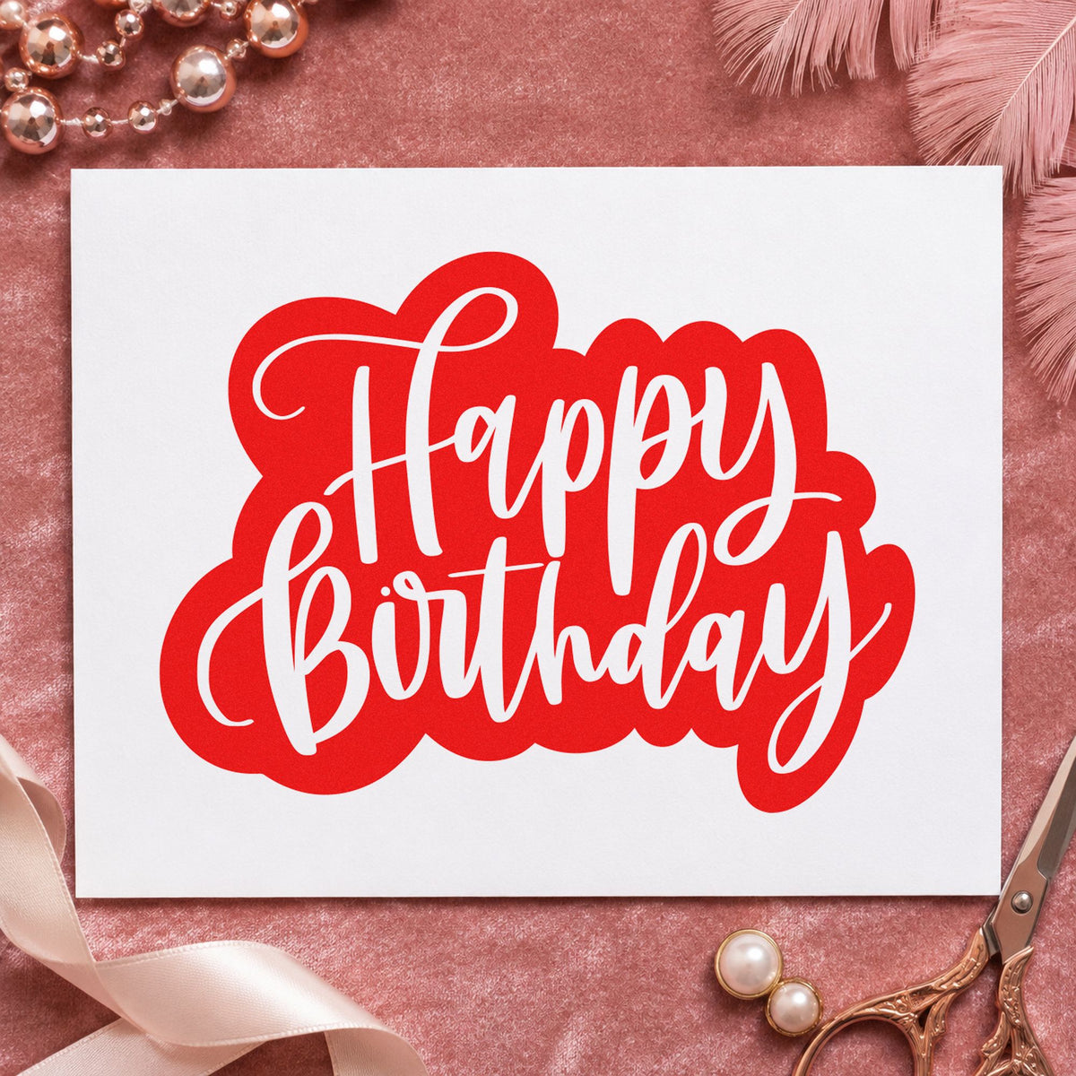 Birthday White Script Silhouette craft stamp imprint in red ink on a handmade project, one idea being care note cards.