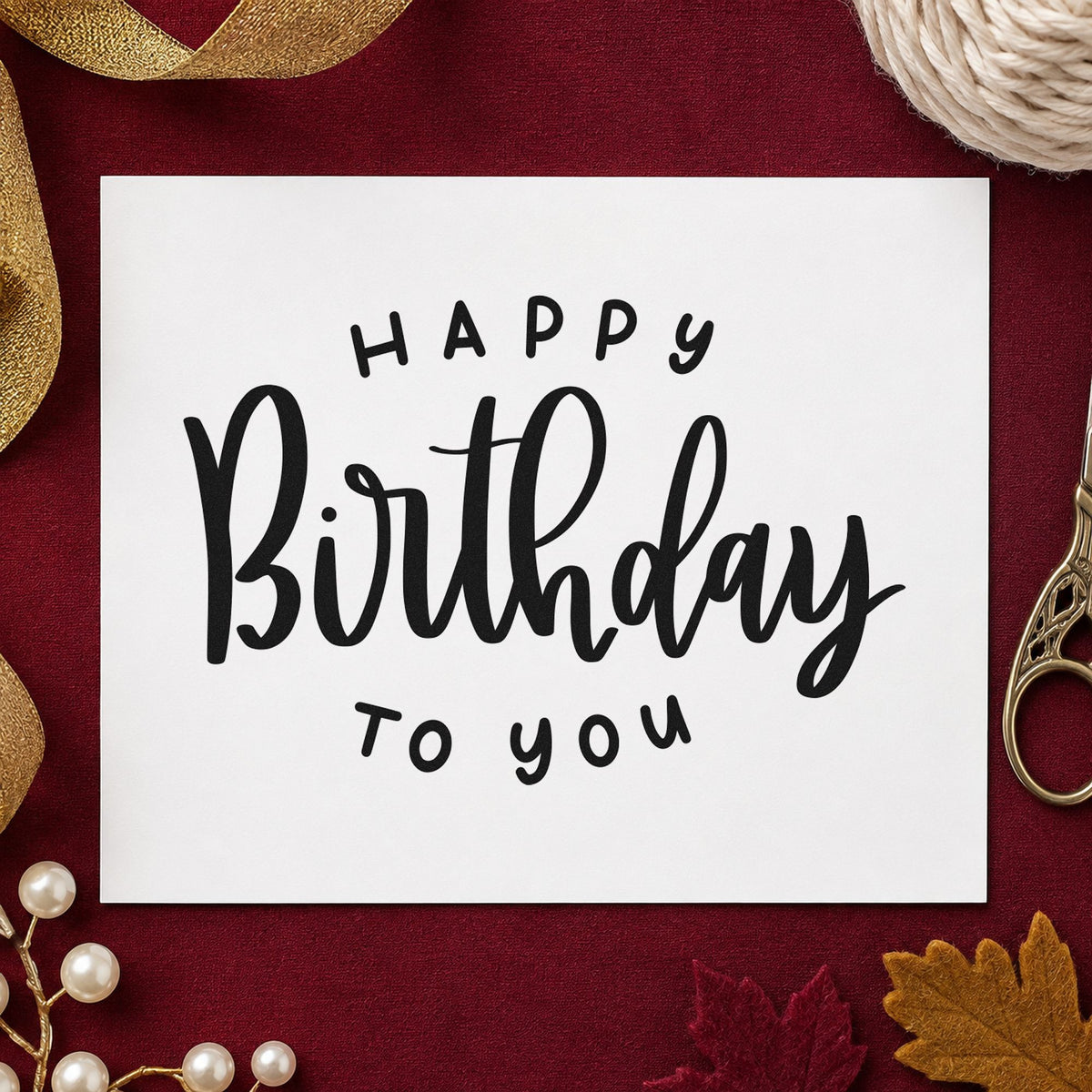 Happy Birthday To You craft stamp imprint in black ink on a handmade project, one idea being song sheet gift tags.