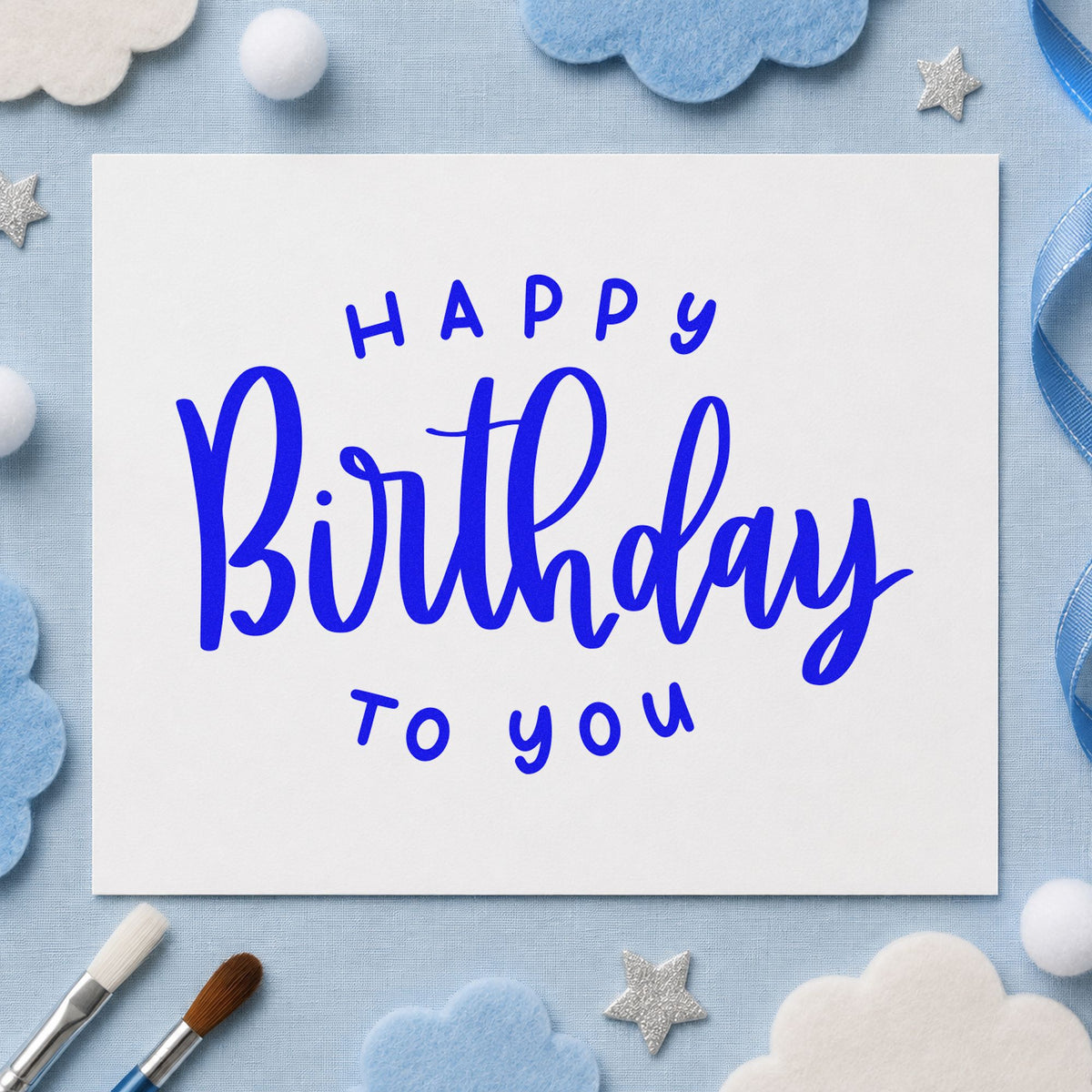 Happy Birthday To You craft stamp in blue ink on cardstock, an easy option for waistcoat printing.