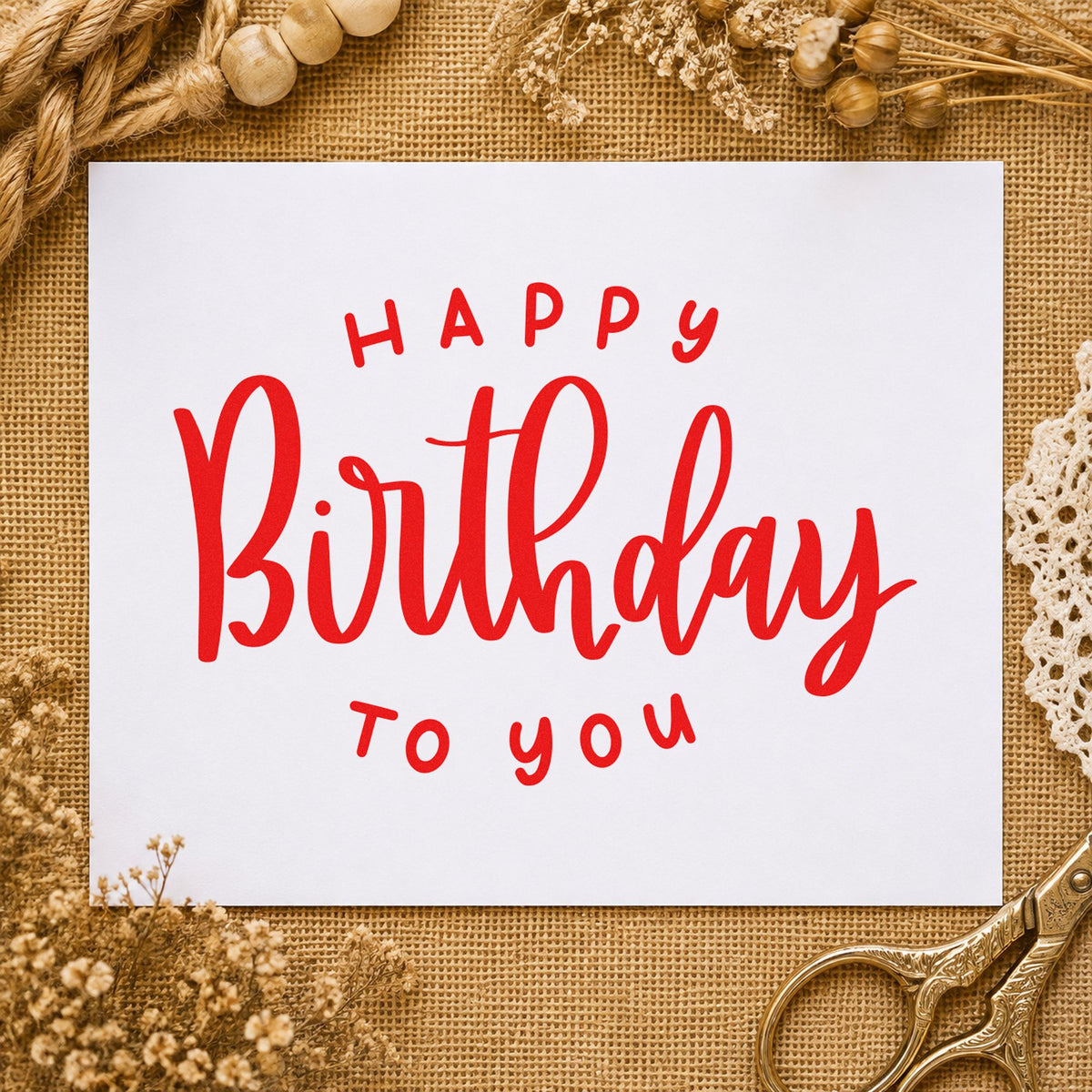 Happy Birthday To You rubber stamp shown in red ink, stamped for projects such as bin prop labels.