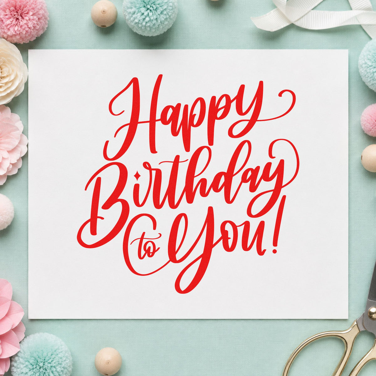 Happy Birthday To You craft stamp imprint in red ink on a handmade project, one idea being house guide cards.