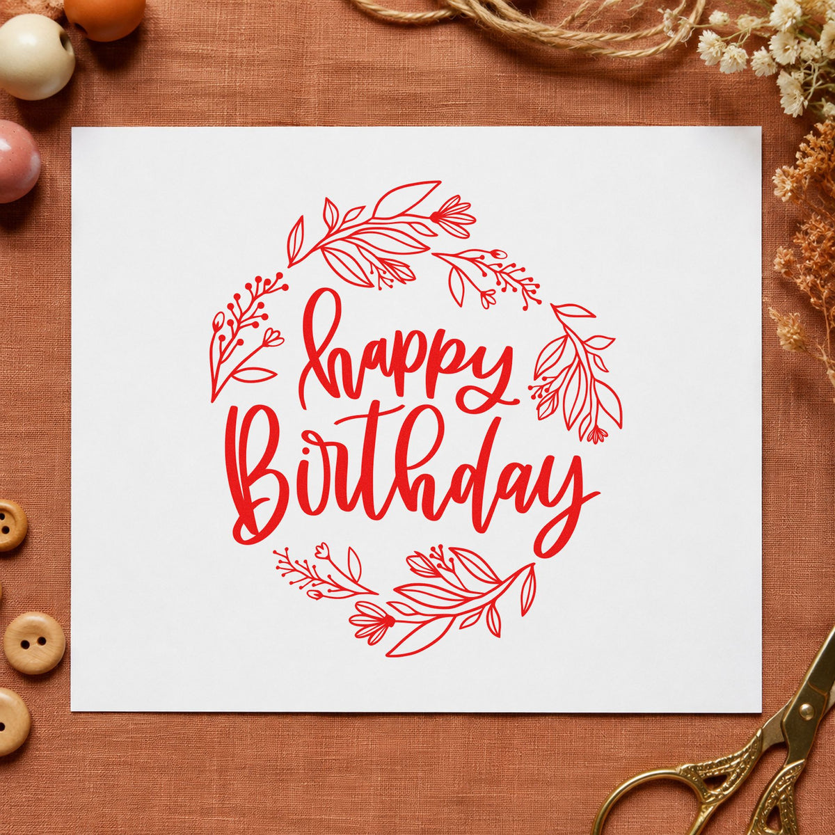 Happy Birthday Leafy Wreath craft stamp imprint in red ink on a handmade project, one idea being class free cards.