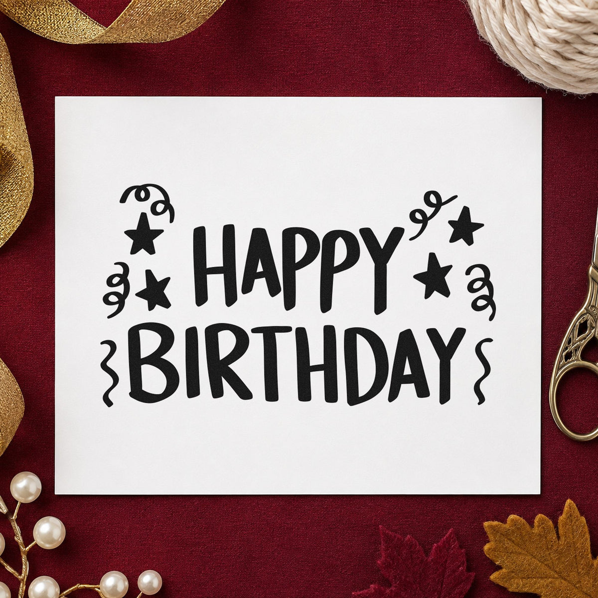 Birthday Stars And Streamers craft stamp imprint in black ink on a handmade project, one idea being cooler gift tags.
