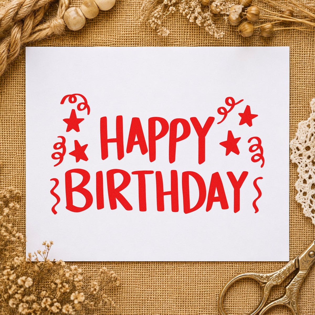Birthday Stars And Streamers rubber stamp shown in red ink, stamped for projects such as bin game labels.