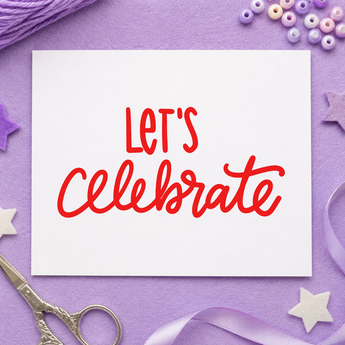 Let's Celebrate Script rubber stamp shown in red ink, stamped for projects such as bin decor labels.