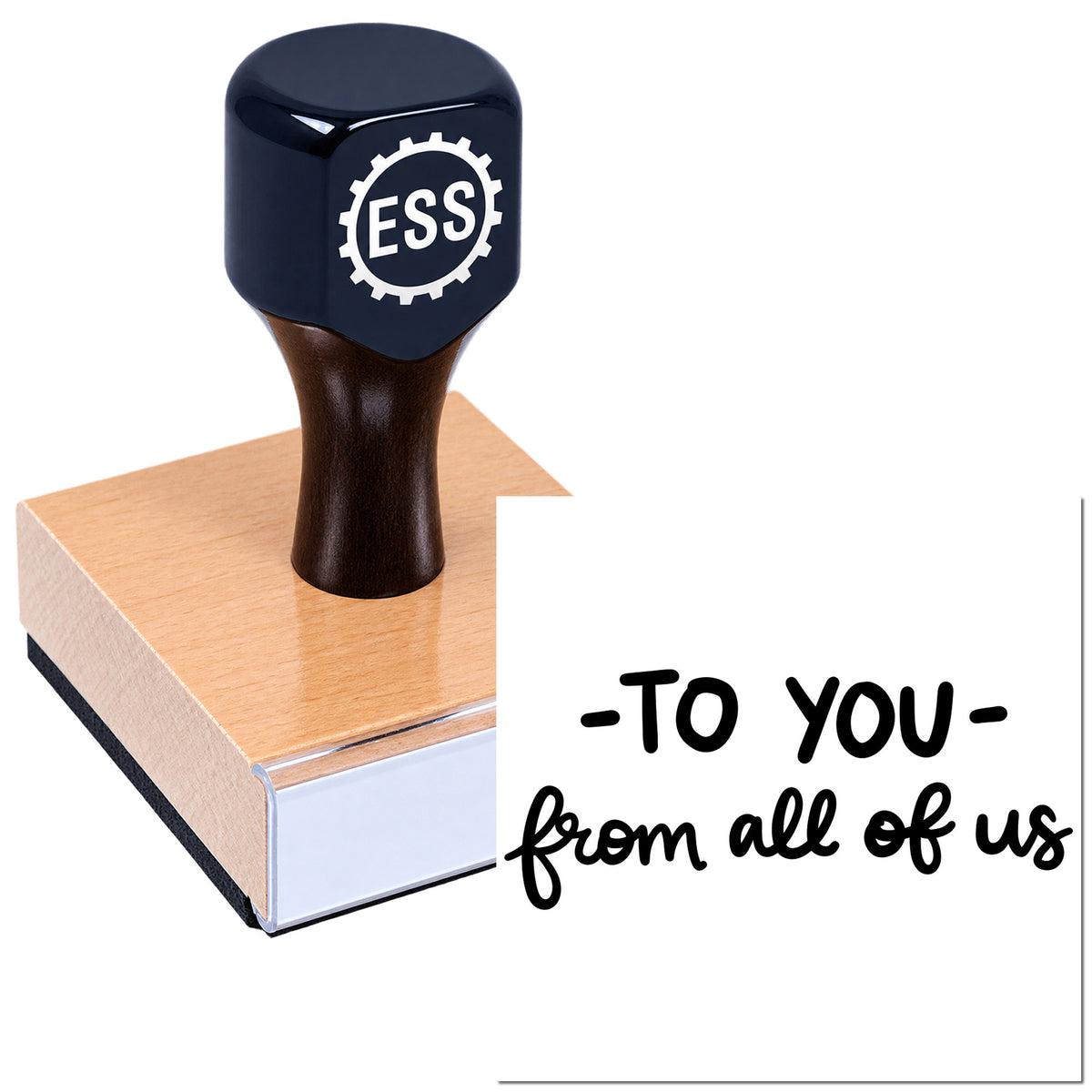 Black ESS rubber stamp and seal on pink wooden block, with "-To YOU- from all of us" on white background.
