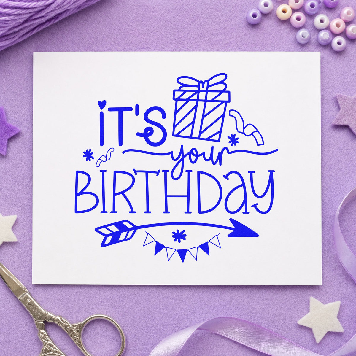 Your Birthday Gift Arrow craft stamp in blue ink on cardstock, an easy option for hunt bag printing.