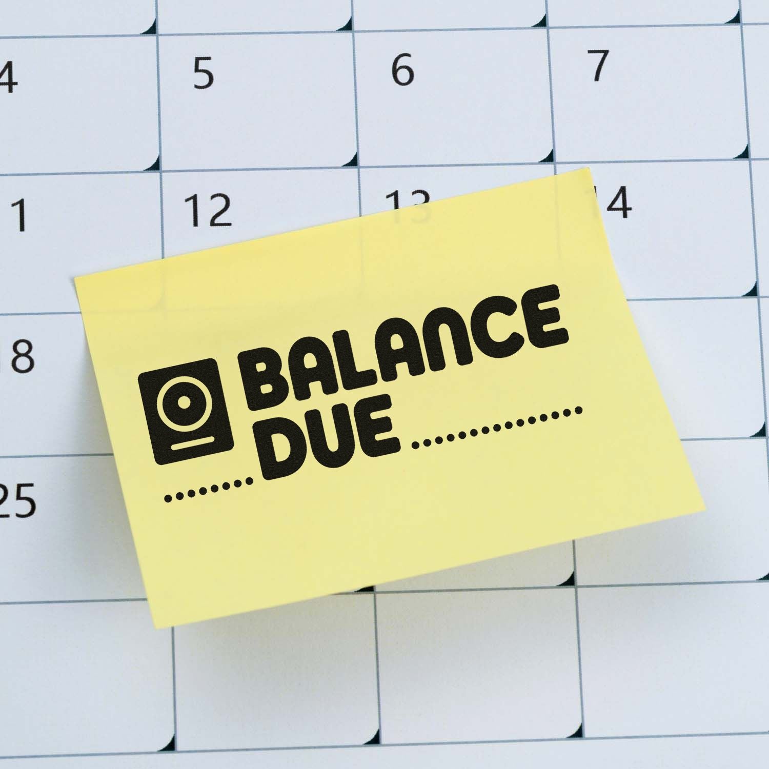 Yellow balance due stamp seal with black text and icon over a calendar grid.