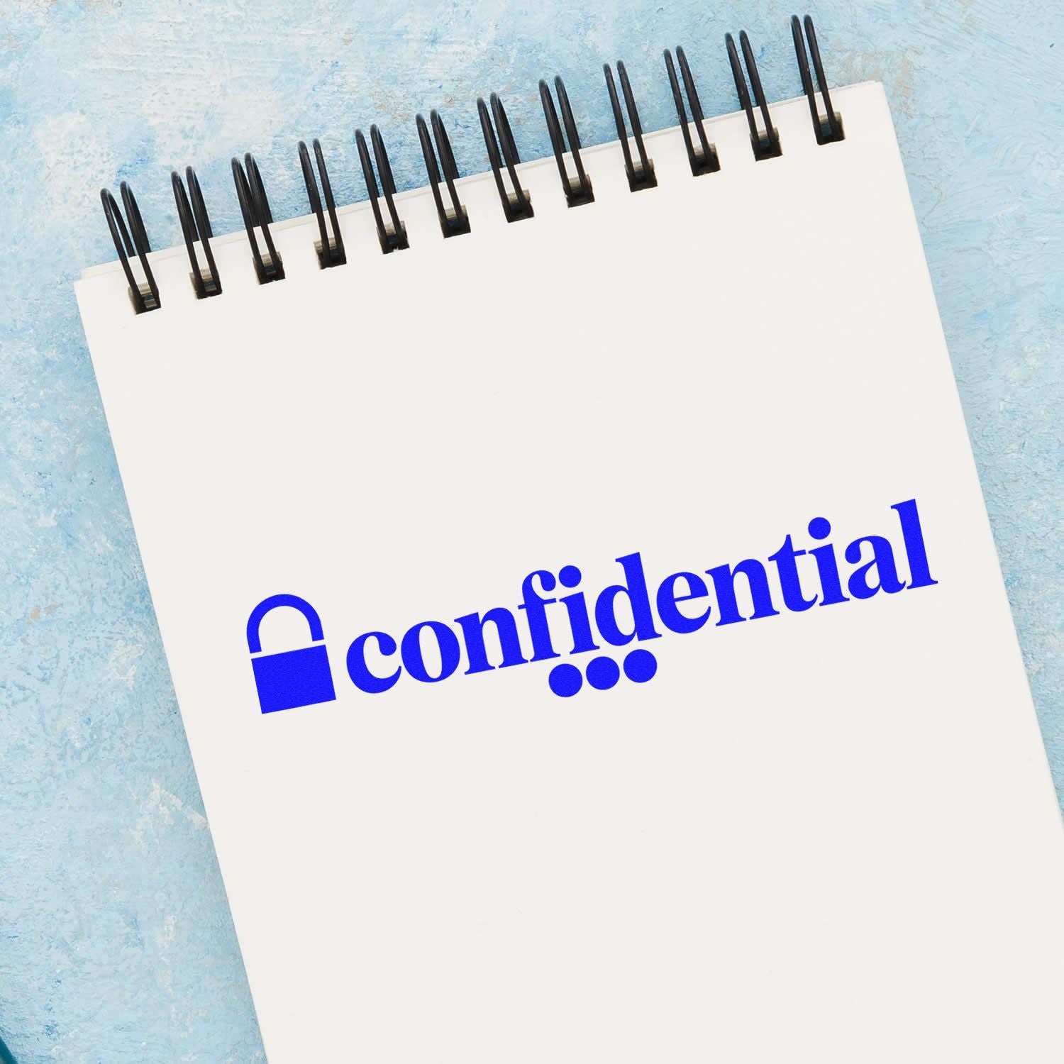Blue confidential seal stamp with lock icon on a white spiral notepad, set against a pale blue background.