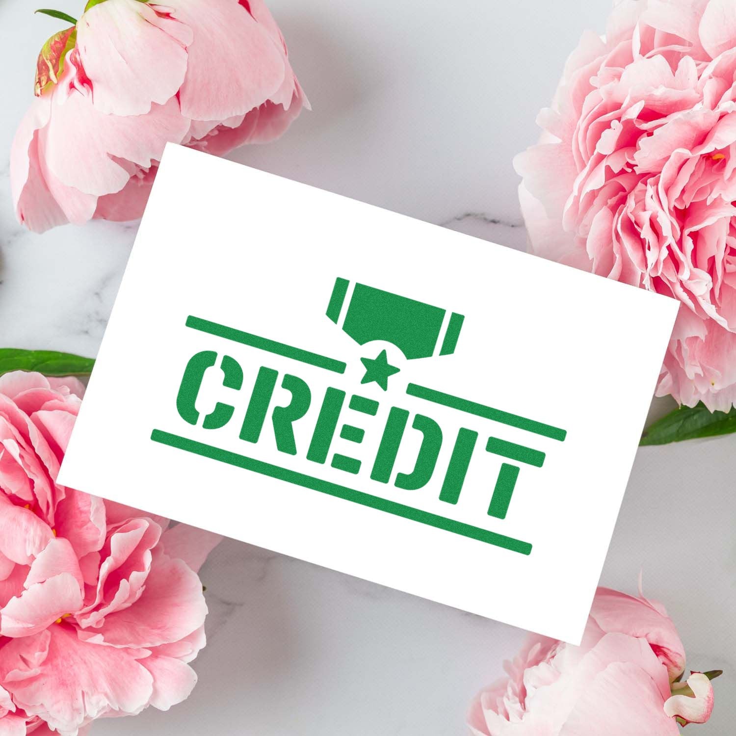 Green CREDIT rubber stamp and seal on white card, surrounded by pink peonies.